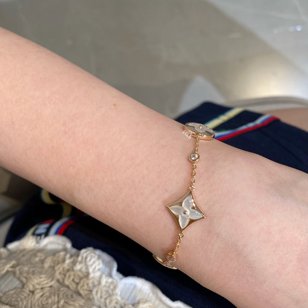 [⭐JeweliWhal]STAR AND SUN 4 MOTIF WHITE MOP PINK GOLD BRACELET